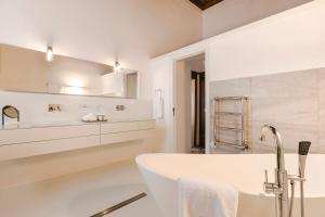 Vannituba majutusasutuses Hydrea Exclusive Hospitality
