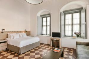 Voodi või voodid majutusasutuse Hydrea Exclusive Hospitality toas