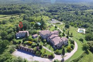 an aerial view of a large estate with a mansion at Borgo Fastelli in Sarteano