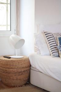 Ένα ή περισσότερα κρεβάτια σε δωμάτιο στο Home Sonhos 17 +3 φωτογραφίες