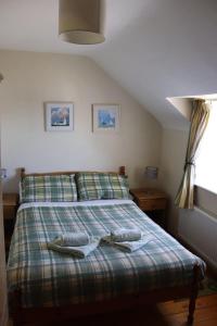 Postel nebo postele na pokoji v ubytování Beautiful 2-Bed Cottage in Kilmore Quay