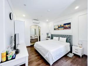 Ein Bett oder Betten in einem Zimmer der Unterkunft Amy Hotel & Apart' Hue