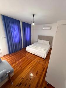 Postel nebo postele na pokoji v ubytování Albedo Apartment