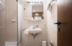 Kúpeľňa v ubytovaní Appartements Pulverer + 24 fotografií
