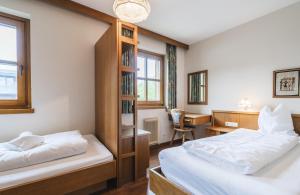 Posteľ alebo postele v izbe v ubytovaní Appartements Pulverer