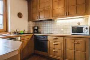 Kuchnia lub aneks kuchenny w obiekcie Appartements Pulverer