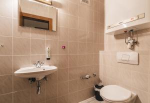 Łazienka w obiekcie Appartements Pulverer