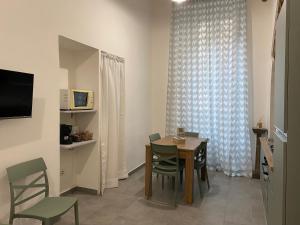 TV a/nebo společenská místnost v ubytování Casa Gemm