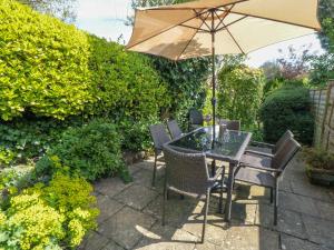 Κήπος έξω από το Tillers Cottage