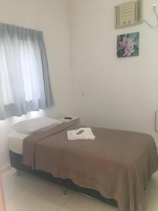 Postel nebo postele na pokoji v ubytování Clip d´Oro Hotel + 5 fotografií