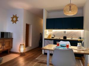 Kuchyň nebo kuchyňský kout v ubytování Exil Apartment