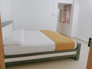 Kunnathoor Red castle vagamon tesisinde bir odada yatak veya yataklar