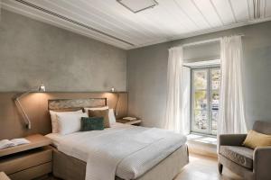 Voodi või voodid majutusasutuse Hydrea Exclusive Hospitality toas