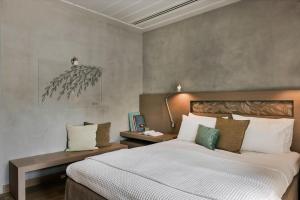 Voodi või voodid majutusasutuse Hydrea Exclusive Hospitality toas