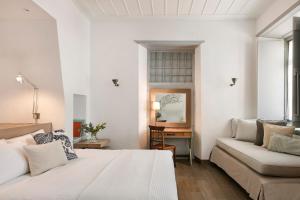Voodi või voodid majutusasutuse Hydrea Exclusive Hospitality toas