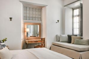 Voodi või voodid majutusasutuse Hydrea Exclusive Hospitality toas