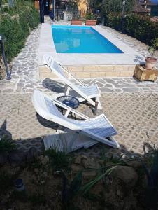 The swimming pool at or close to Il Podere di Massi