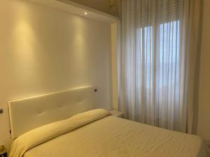 Postel nebo postele na pokoji v ubytování Hotel Vietri Coast