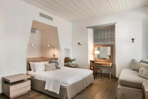 Voodi või voodid majutusasutuse Hydrea Exclusive Hospitality toas
