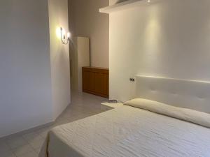 Postel nebo postele na pokoji v ubytování Hotel Vietri Coast