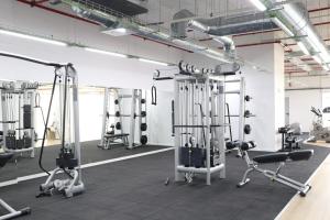 a gym with several treadmills and machines at Rivas Futura in Rivas-Vaciamadrid