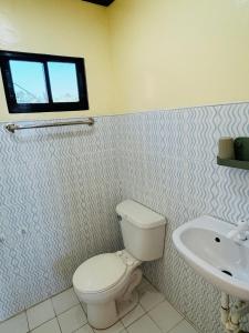 Koupelna v ubytování Edem Tourist Inn Malapascua