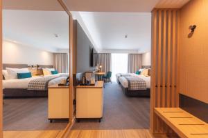 Кровать или кровати в номере Holiday Inn Blackpool by IHG