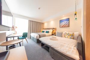 Кровать или кровати в номере Holiday Inn Blackpool by IHG