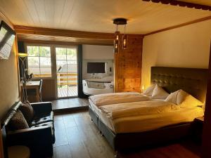Voodi või voodid majutusasutuse Chalet Hotel Adler toas