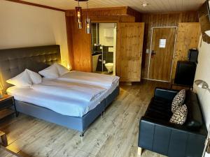 Voodi või voodid majutusasutuse Chalet Hotel Adler toas