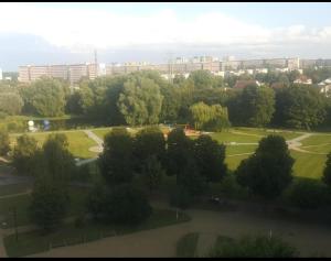 an aerial view of a park with trees and buildings at Mieszkanie 2 pokojowe z widokiem na morze in Gdańsk