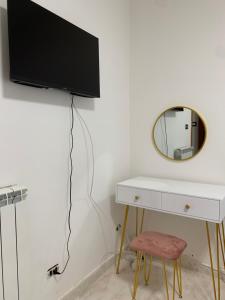 A television and/or entertainment centre at Casa Ammare