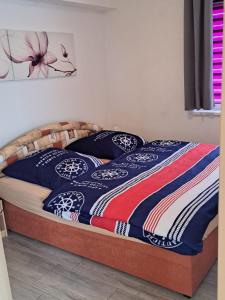 Кровать или кровати в номере Ferienwohnung Müller