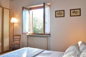 Una cama o camas en una habitación de Montecasciano - Mimosa