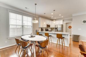 a kitchen and dining room with a table and chairs at Modern Virginia Beach Retreat in Resort District! in Virginia Beach