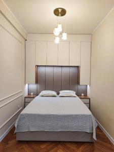 Кровать или кровати в номере Park Avenue One-Room