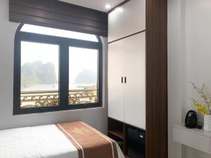 Postel nebo postele na pokoji v ubytování KING HOTEL