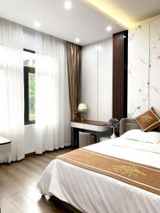 Postel nebo postele na pokoji v ubytování KING HOTEL
