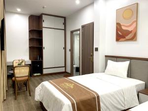 Postel nebo postele na pokoji v ubytování KING HOTEL