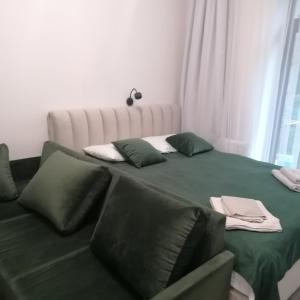 Postel nebo postele na pokoji v ubytování КарпатиКайзервальд.