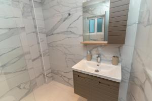 O baie la Island Life Apartment