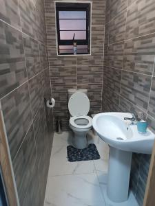 Bilik mandi di Cozy home