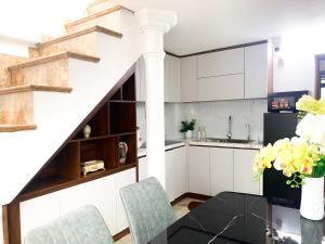 Kuchyň nebo kuchyňský kout v ubytování KING HOTEL