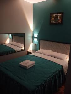 Ένα ή περισσότερα κρεβάτια σε δωμάτιο στο Hostal El Pilar