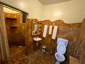 Kylpyhuone majoituspaikassa Afro Smile Hotel and Guest House