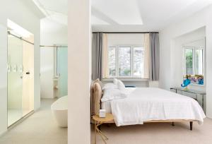 Posteľ alebo postele v izbe v ubytovaní Le donne di Capri - Charming apartments in Capri