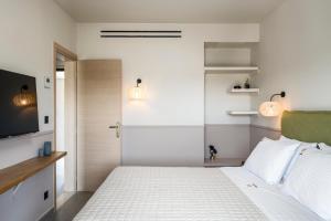 Фотография из галереи Loadstar Rooms & Suites в Контокали +47 фотографий