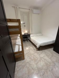 Postel nebo postele na pokoji v ubytování Scalo 71 GUEST HOUSE