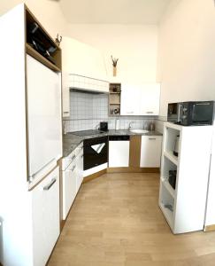 Kuchyň nebo kuchyňský kout v ubytování Vienna Excellent Apartments