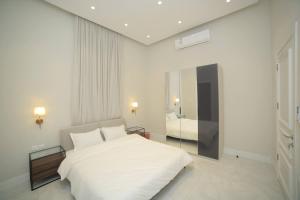 Ένα ή περισσότερα κρεβάτια σε δωμάτιο στο تان ڤيو - Tan view +117 φωτογραφίες